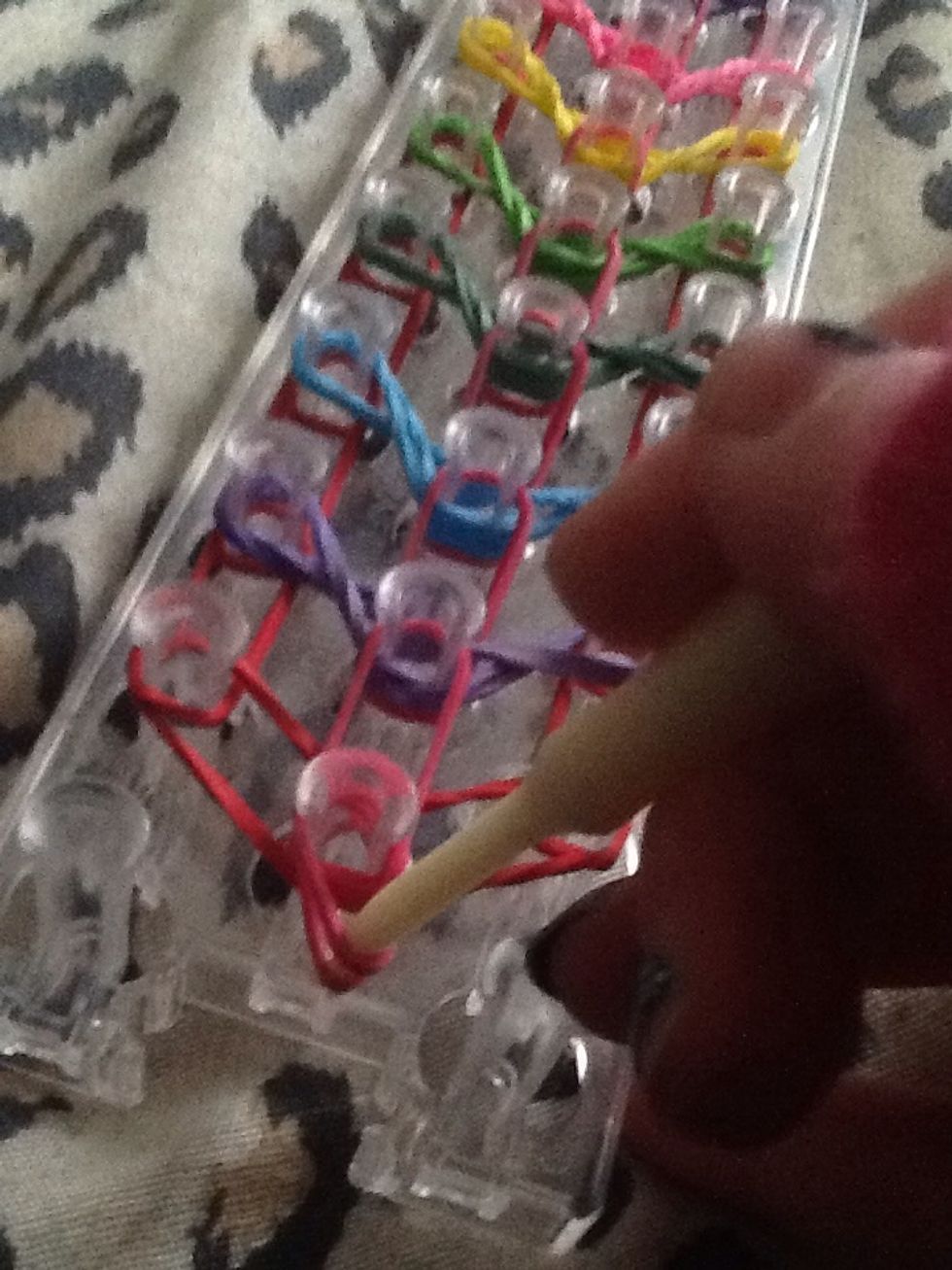 under the cap band...