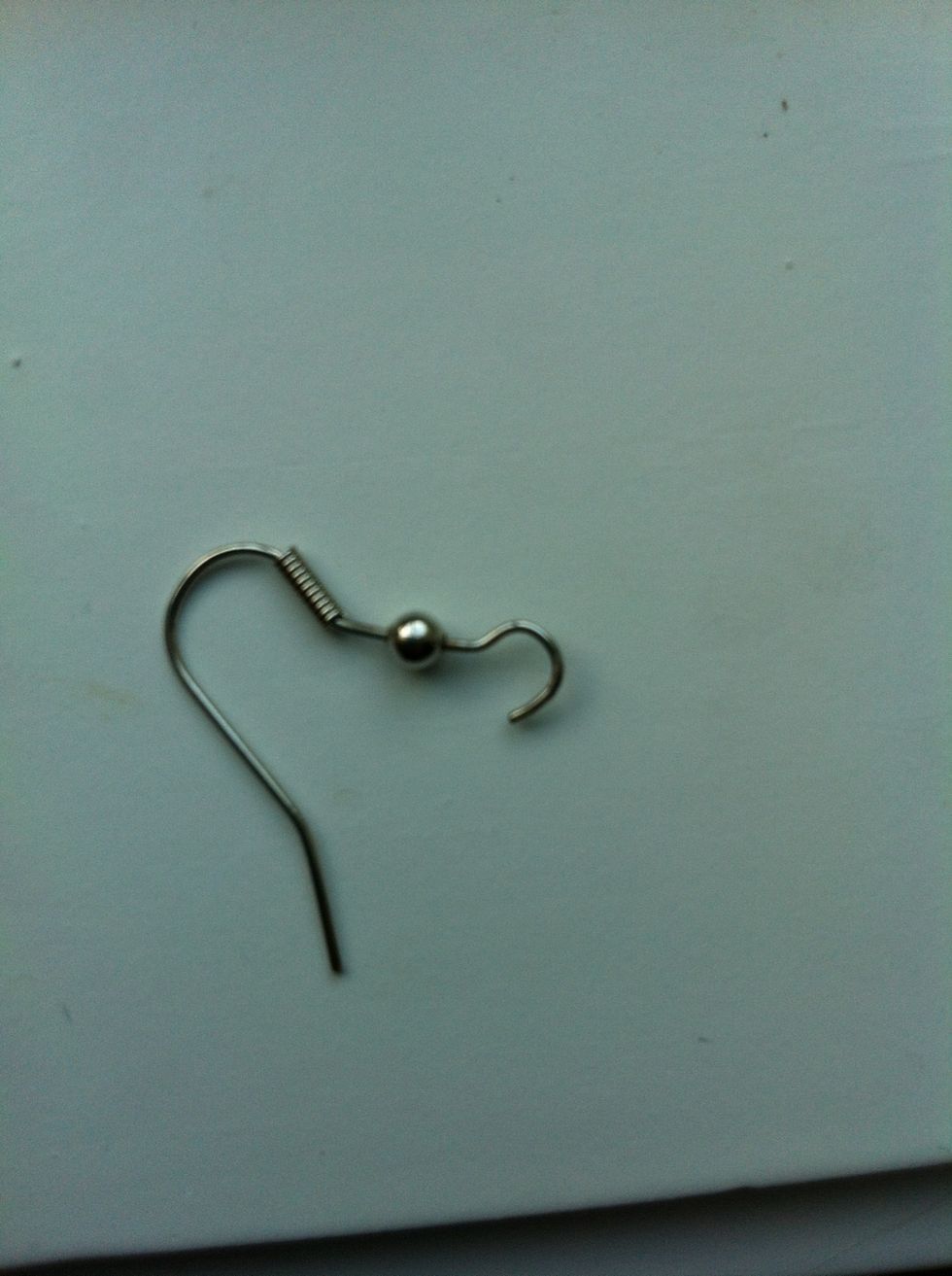 Undo the rings of the two earrings