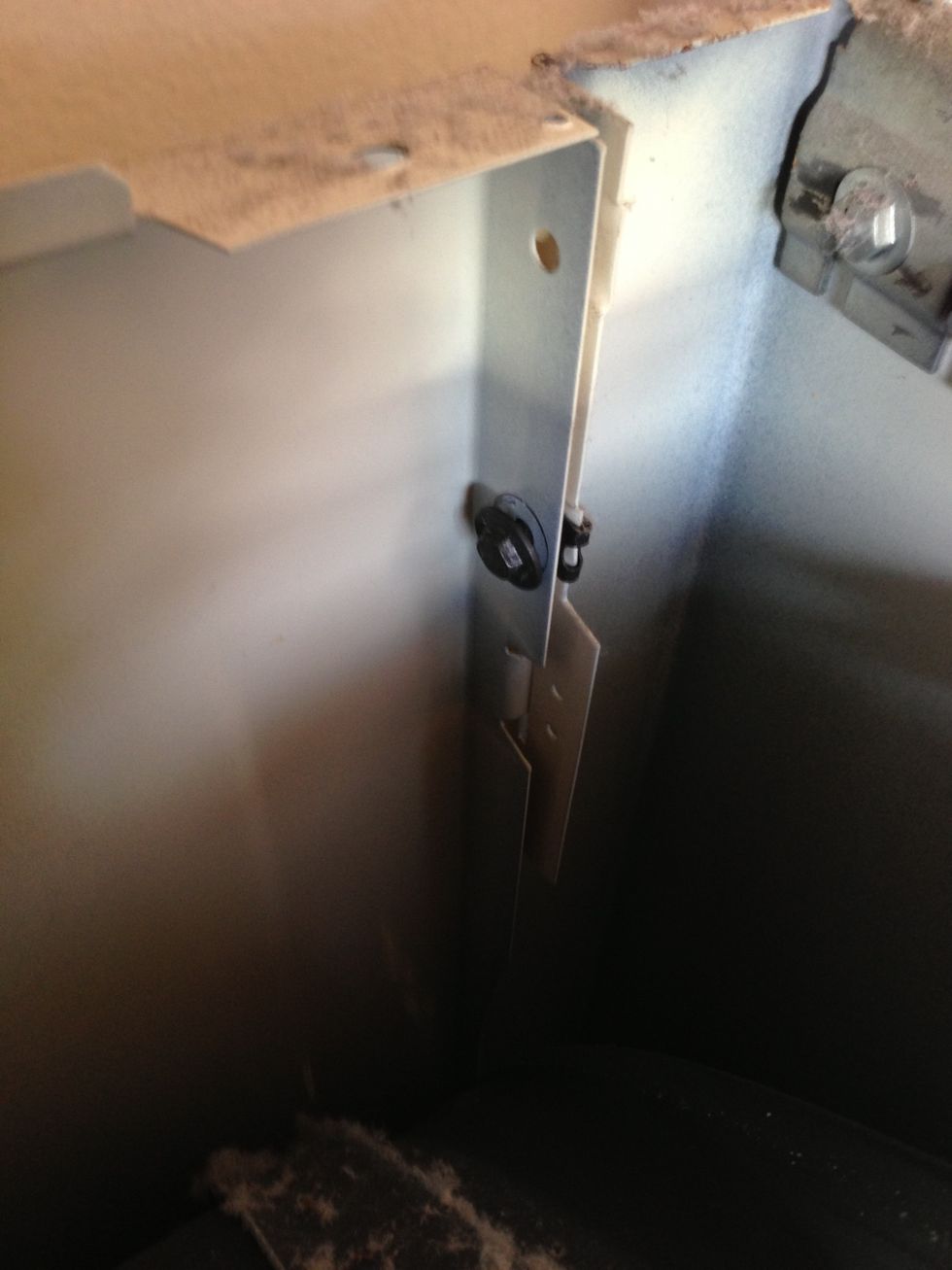 Undo the screws at either side of the front section. My dryer only has one on each side so this was pretty easy.