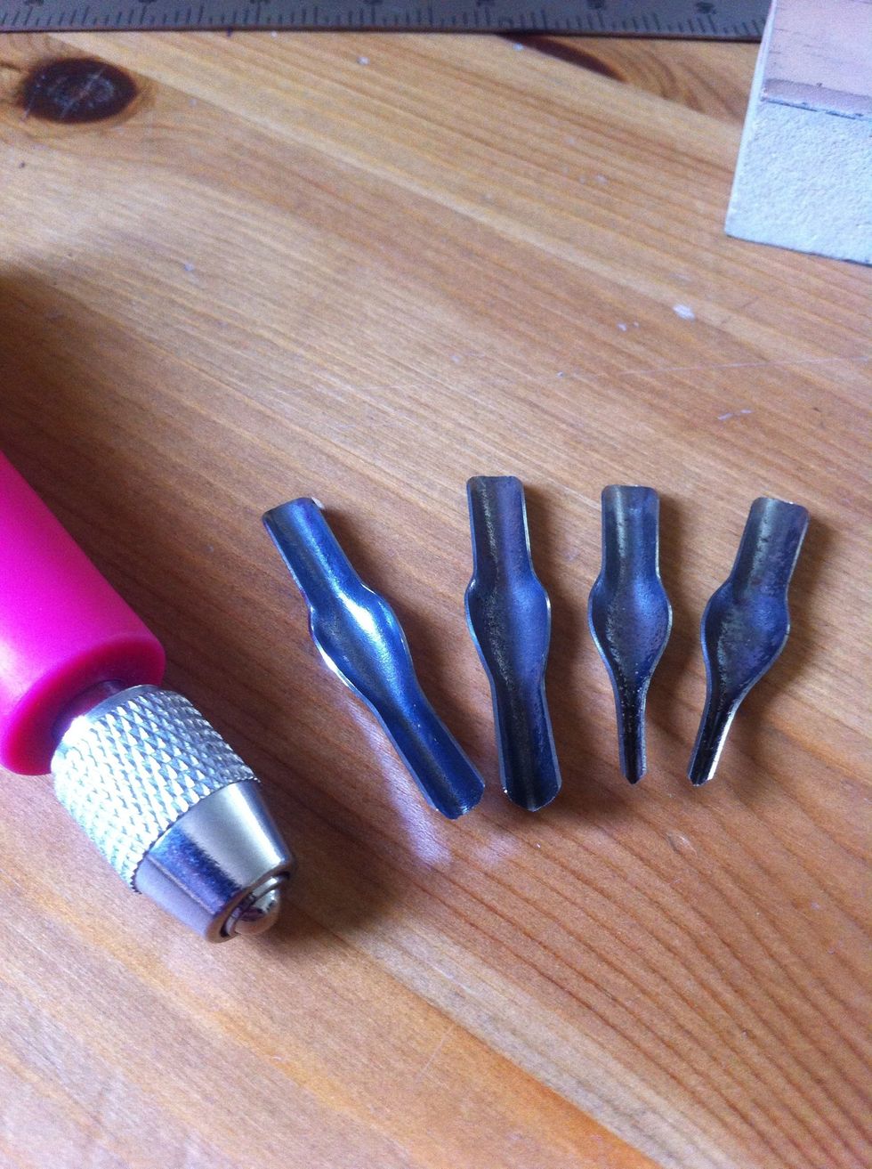 unearth your carving tool. you can buy these at any art supply store. I stole mine from a kindergardener. it was easy.