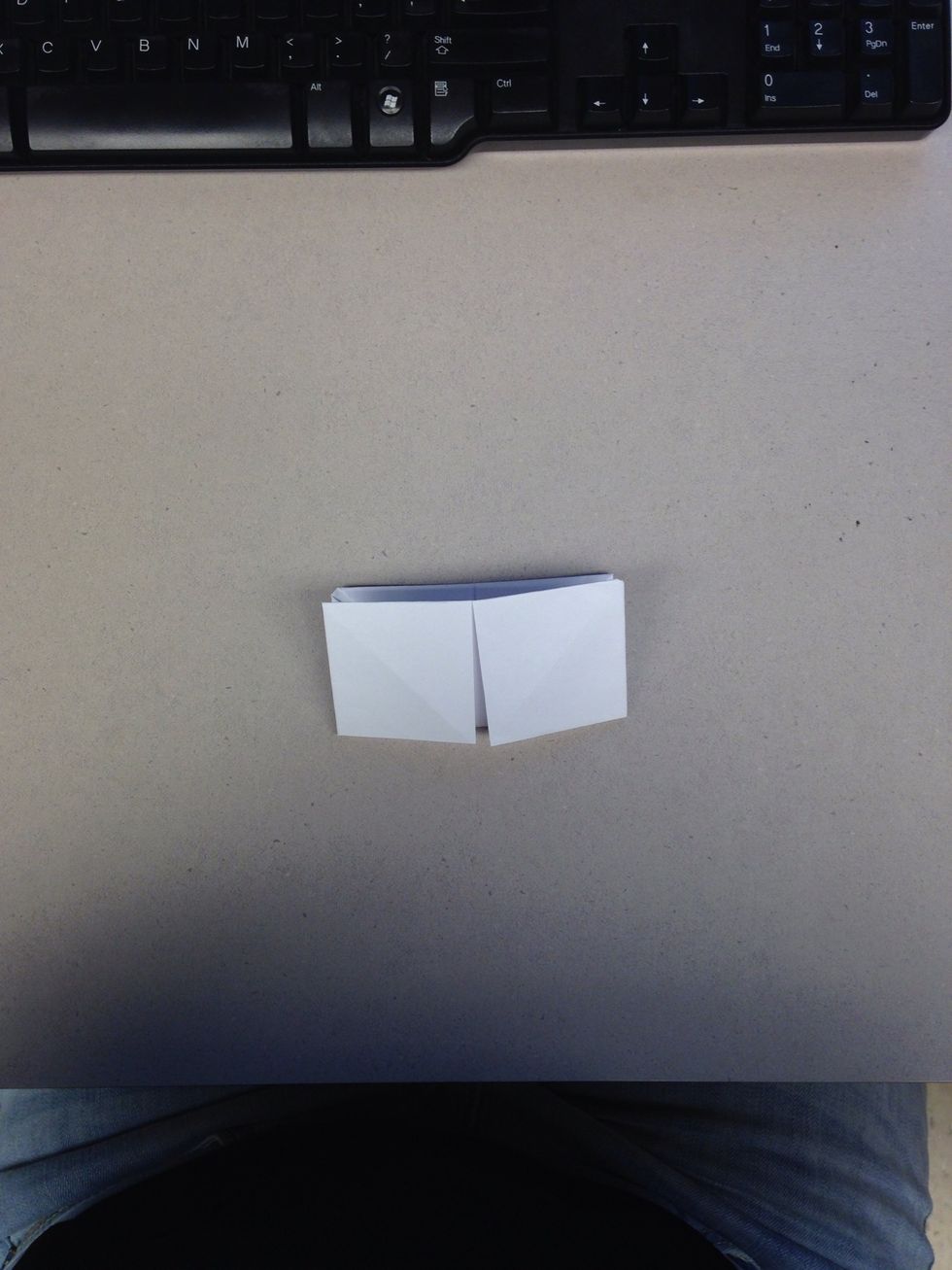 Unfold and fold it in half the other way.