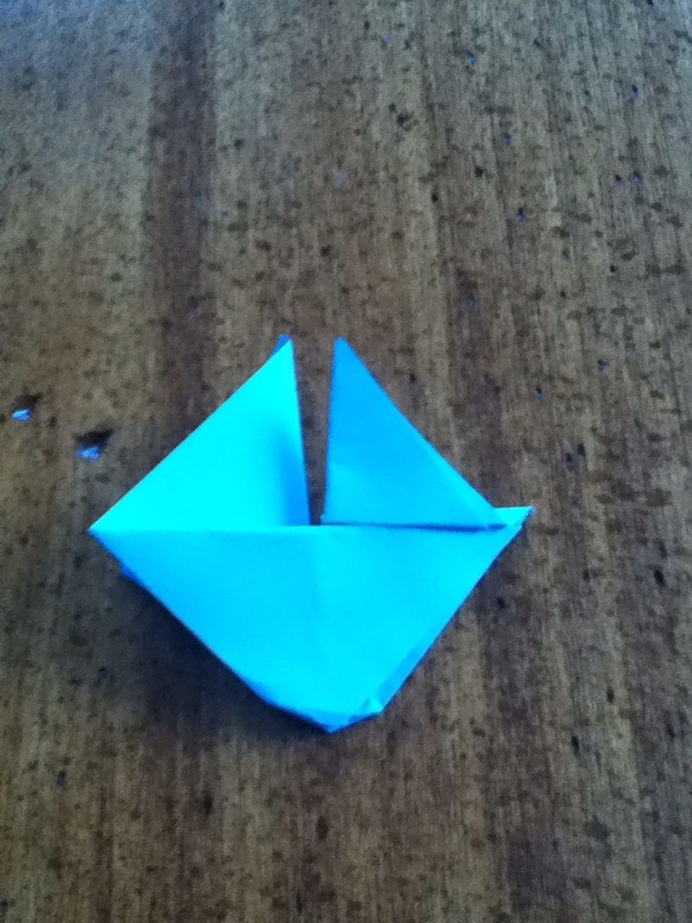 Unfold, but not all the way. Crease.