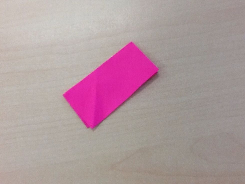 Unfold,fold in half,now resulting in a rectangle.