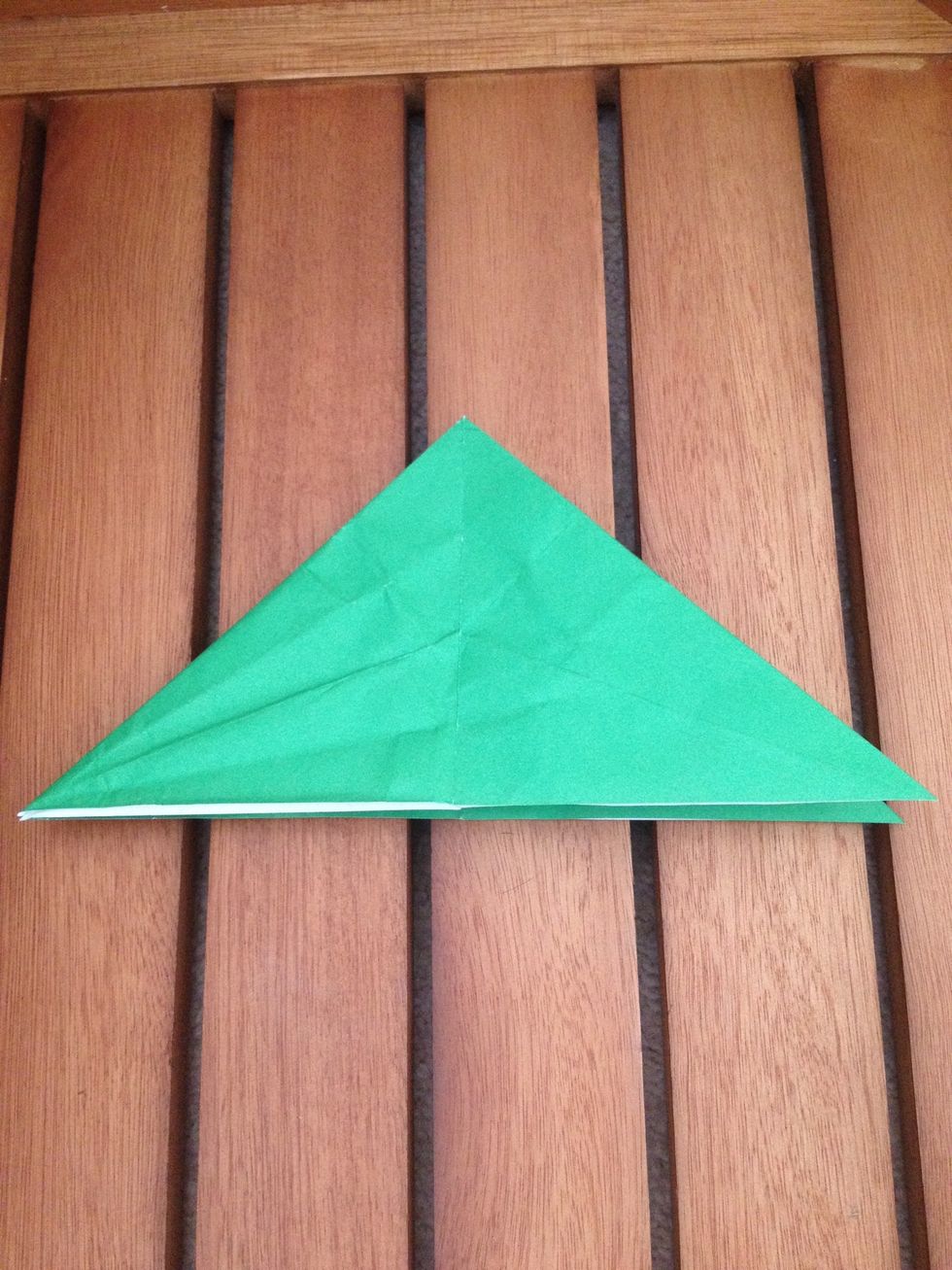 Unfold it again. Your crease for the next step has now been made.