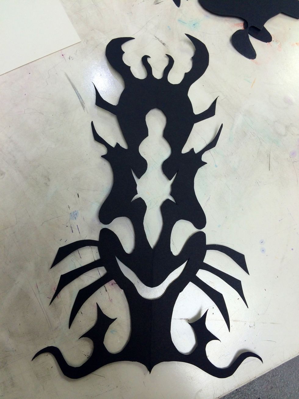 Unfold the black paper.ooooo, insecty!