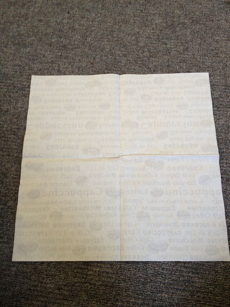 Unfold the napkin completely.