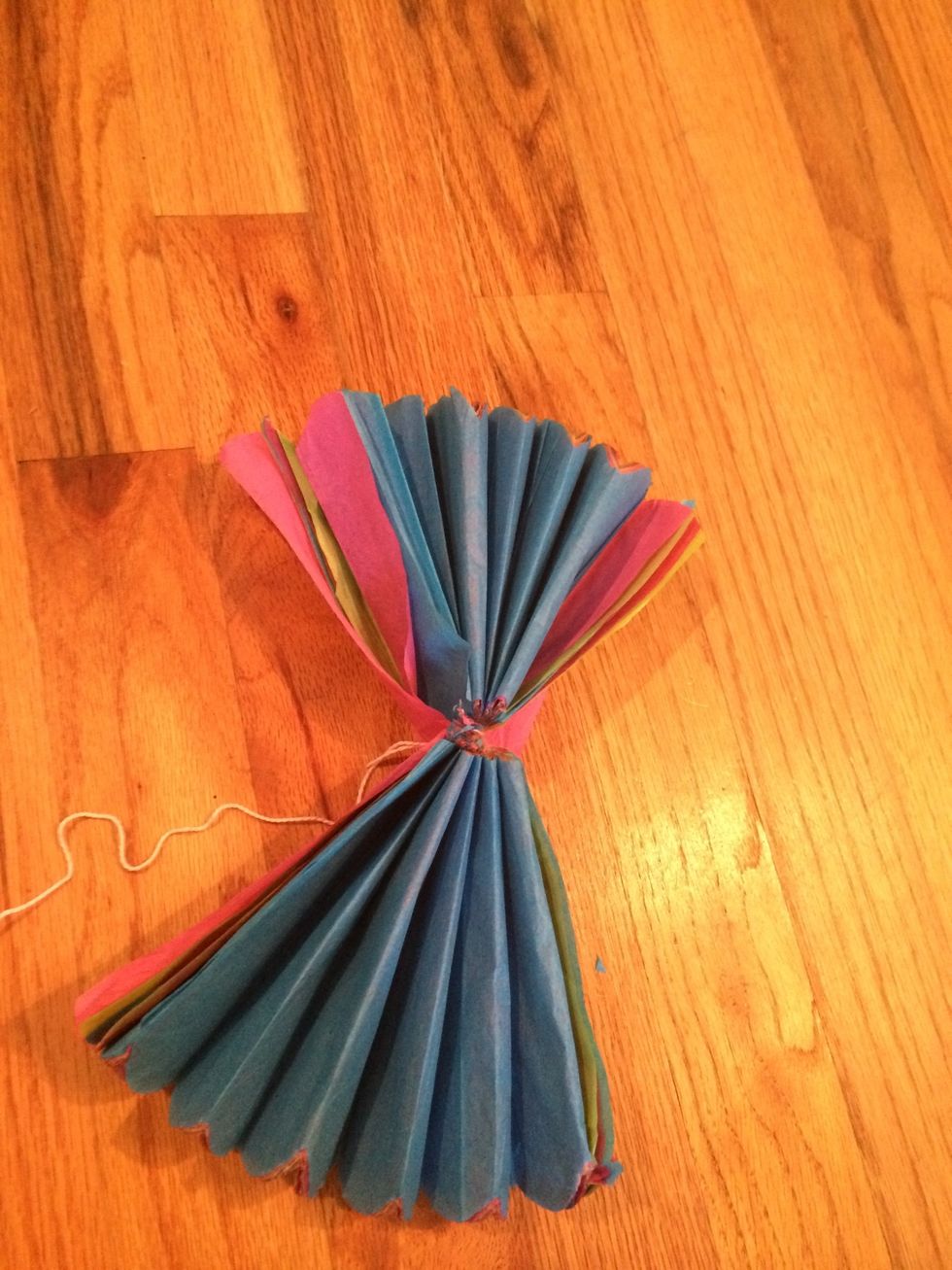 Unfold the paper a little bit to look like a giant fan