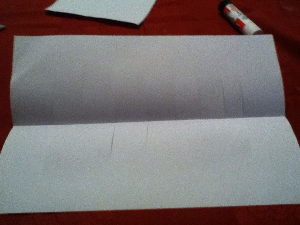 Unfold the piece of paper