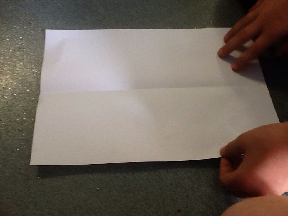 Unfold the piece of paper.