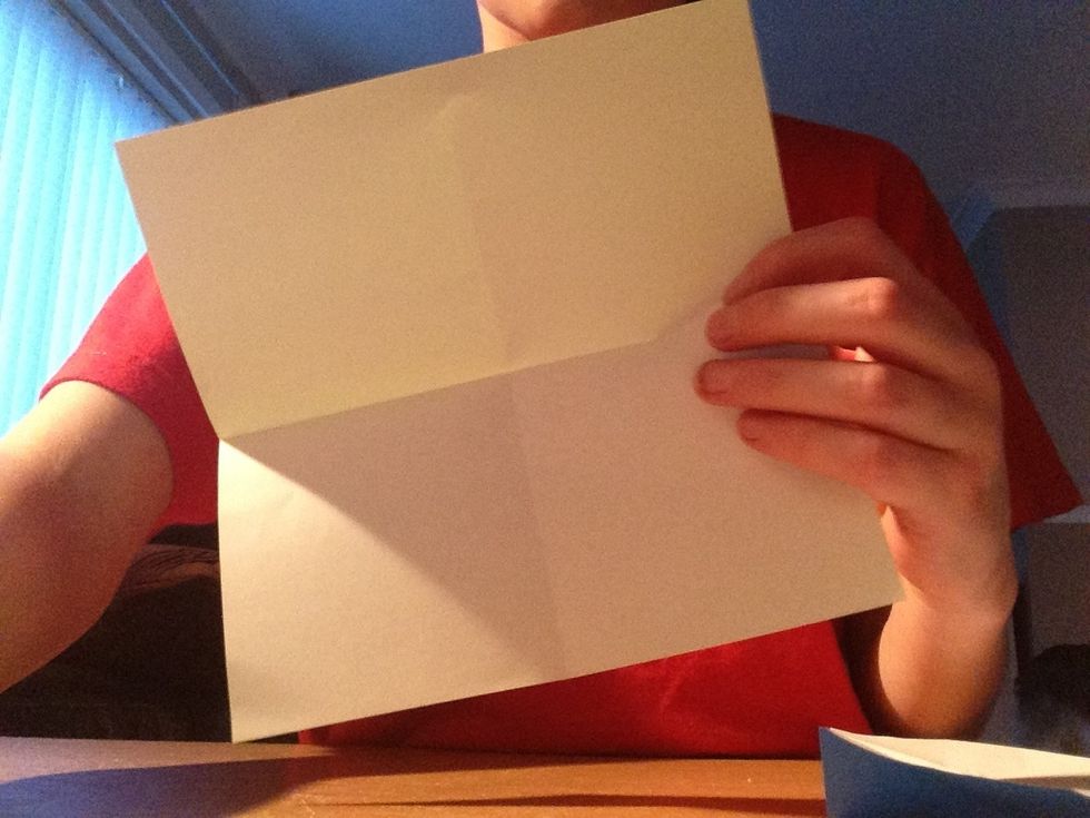 Unfold to find a cross in the centre of your paper