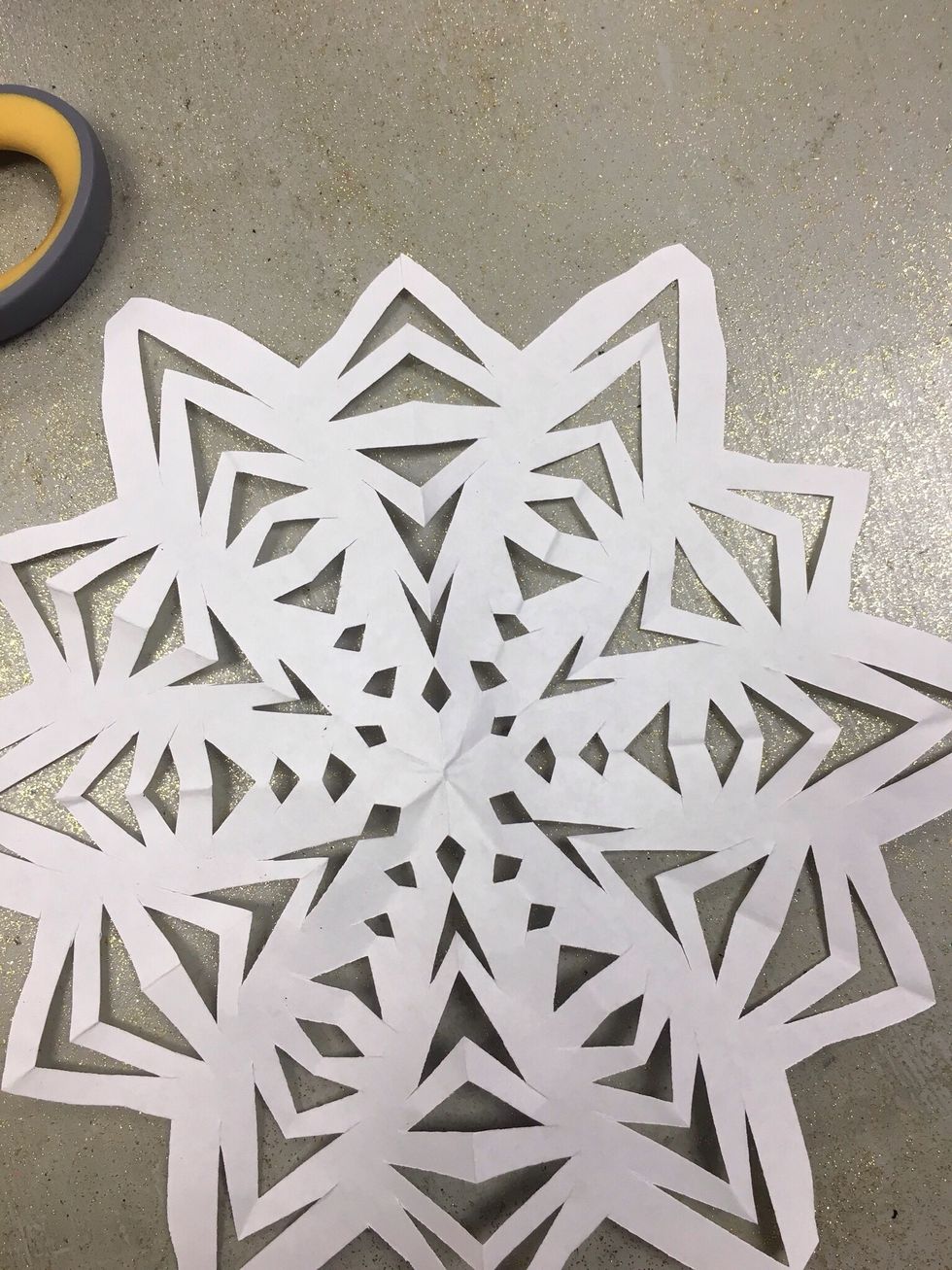 Unfold your snowflake and admire your hard work!