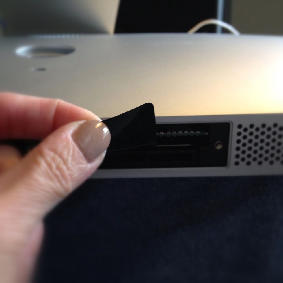 Unfurl the plastic tabs and pull out the existing RAM (unless you're just adding additional bits rather than replacing all the RAM) - don't be afraid to give it a good tug