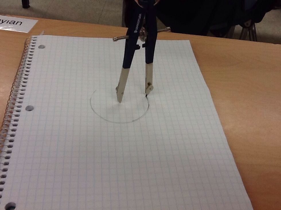 Unless you already have a circle start by using you protractor to draw a perfect circle