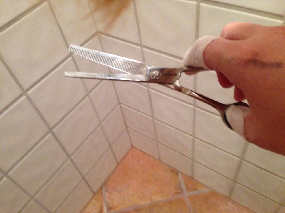 Unless you have scissors like these - then you can cut straight and soften the edges after by angeling this scissor and cutting where the hair looks chunky or too thick.