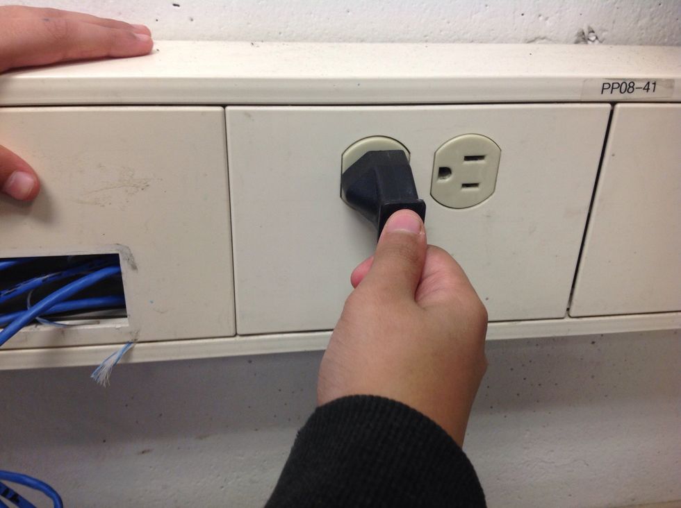 Unplug the straightener and turn it off.