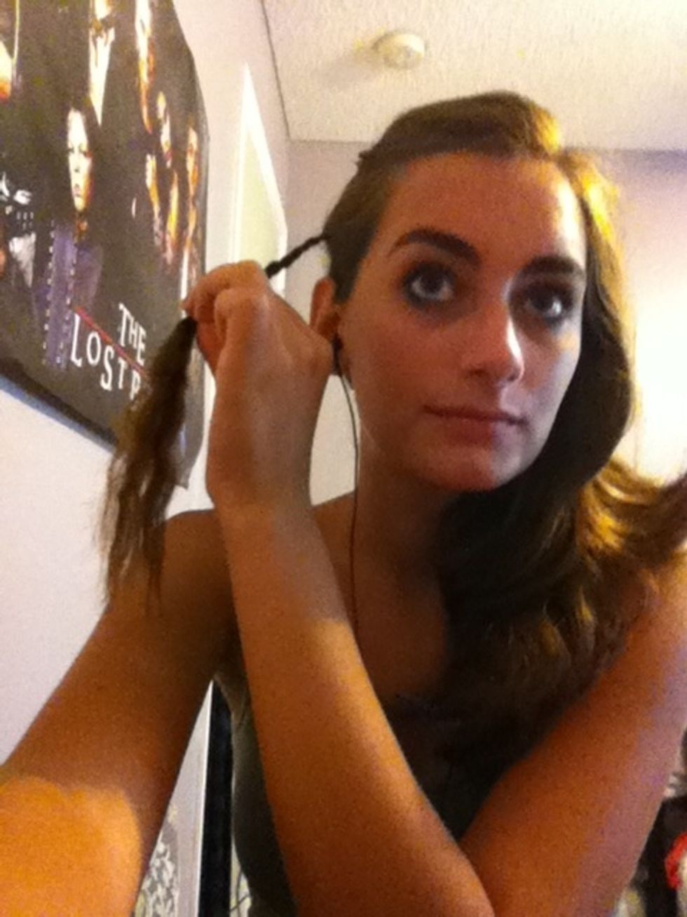 Unravel your braid (plait). The wavy texture it leaves behind makes the process much easier.