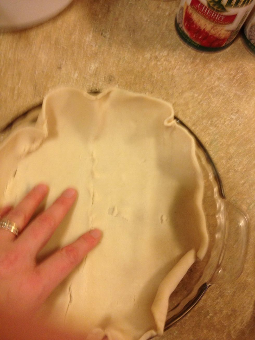 Unroll one pie crust and fit to the bottom of pie pan