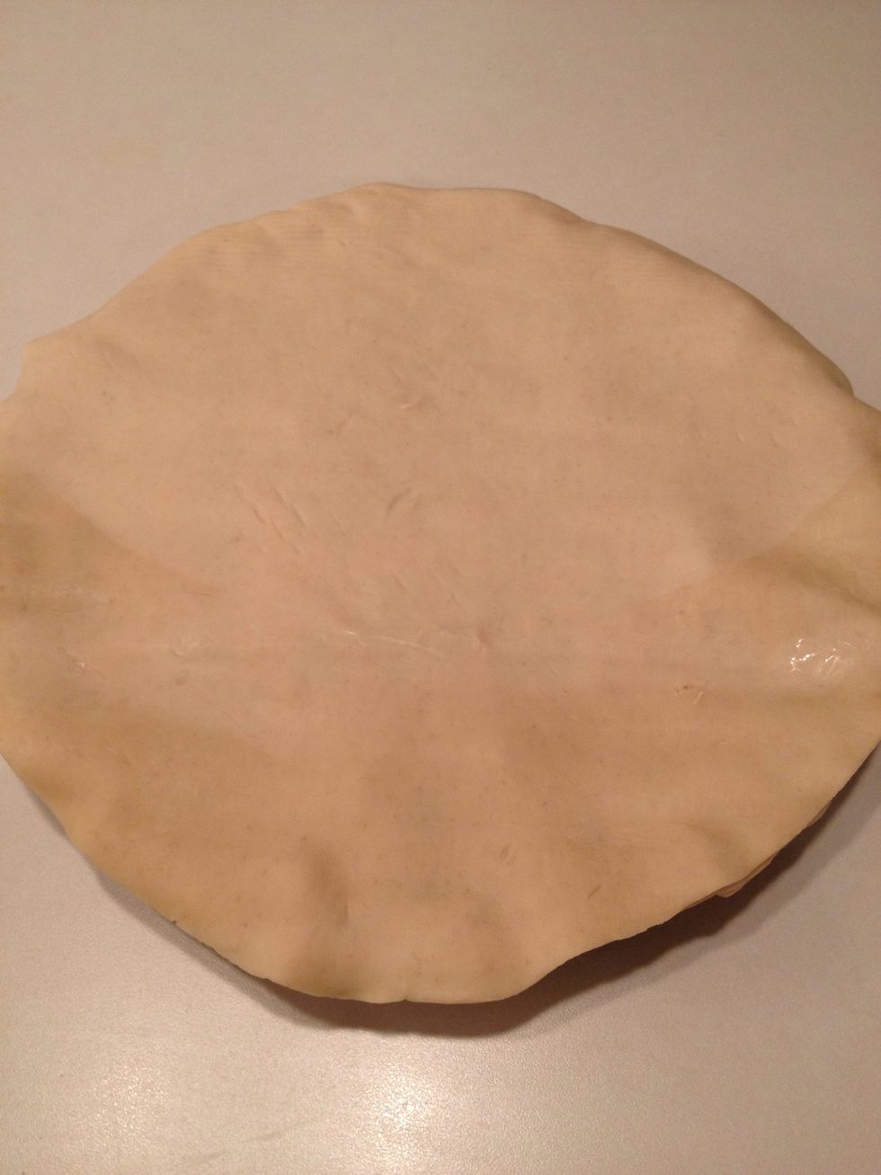 Unroll second pie crust and lay on top of pot pie.