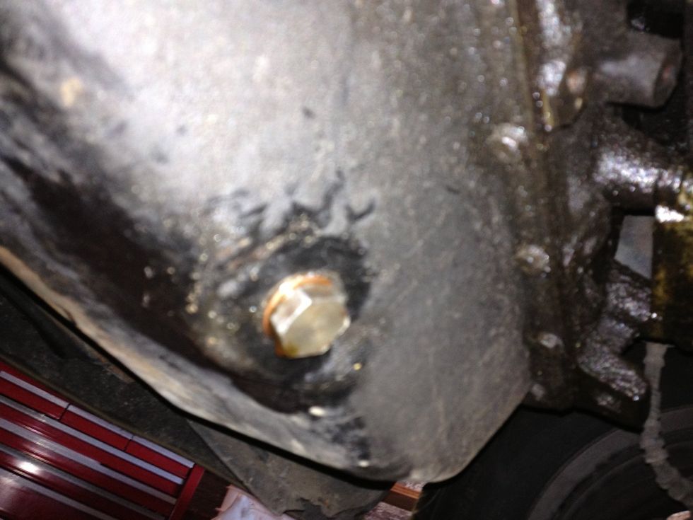 Unscrew oil pan bolt! - 19mm socket.