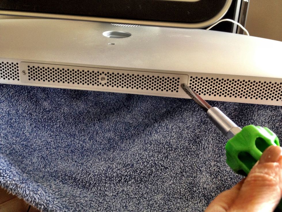 Unscrew the 3 screws from the bottom plate