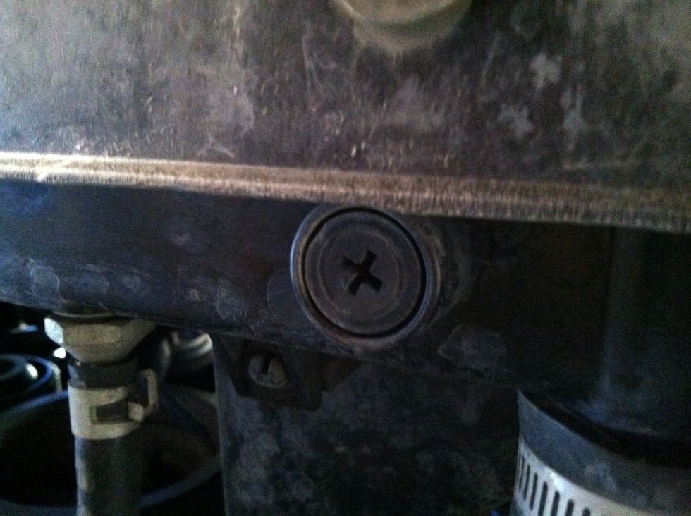 Unscrew the radiator drain plug.