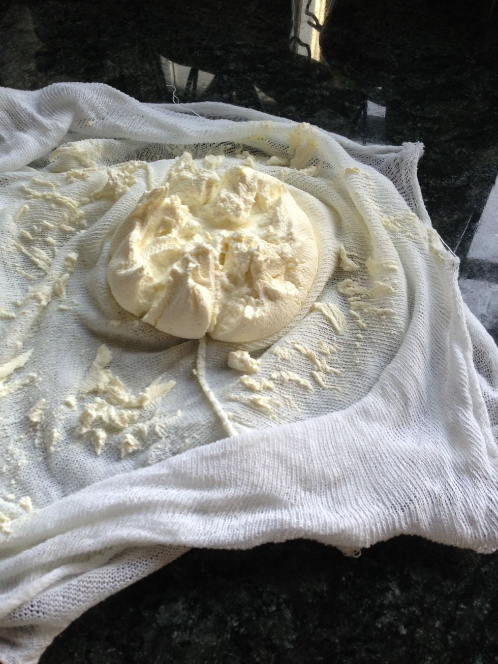 Untie bag and spread out on a work surface. Labeneh looks as shown. Transfer it into a similar size bowl.. I do in one go by turning muslin upside down over the bowl.
