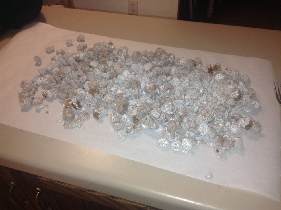 Until fully coated, lay the puppy chow on wax paper for about 3-5 minutes.