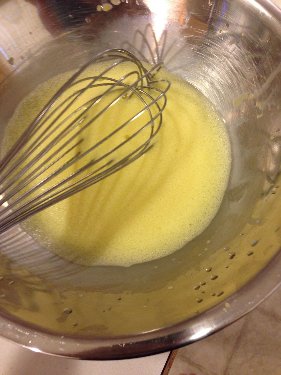 Until it looks pale yellow. Then add melted butter slowly and whisk 4-5 minutes. You can use a hand mixer to make it easy on you! After butter is incorporated add lemon juice, salt and pepper, whisk