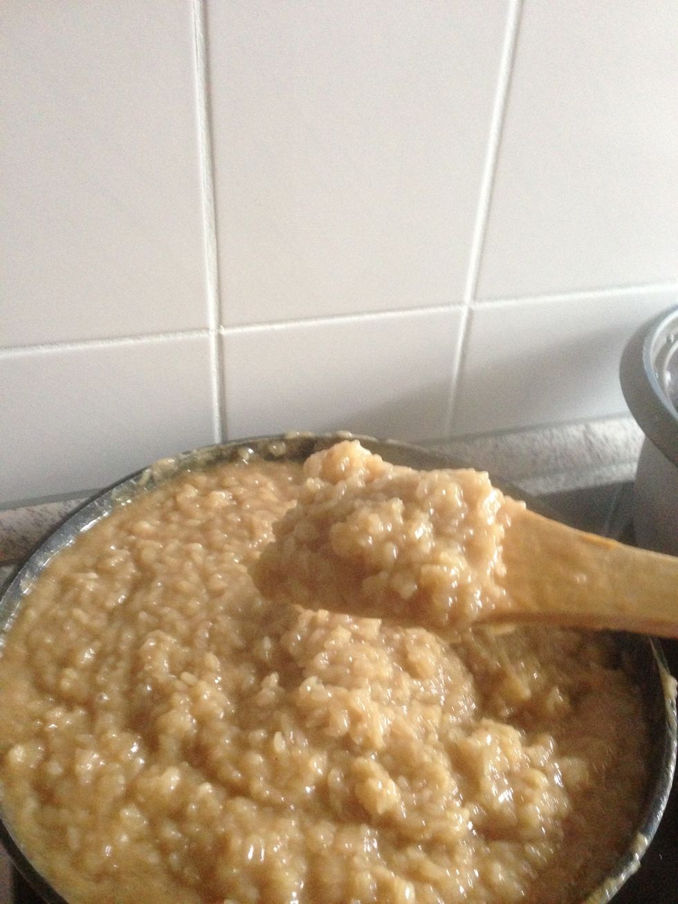 Until it's really  Sticky like this.  Then fill it into any Form you like! I put a Sheet of baking paper inbetween. Now bake it  for about.     15-20  minutes.