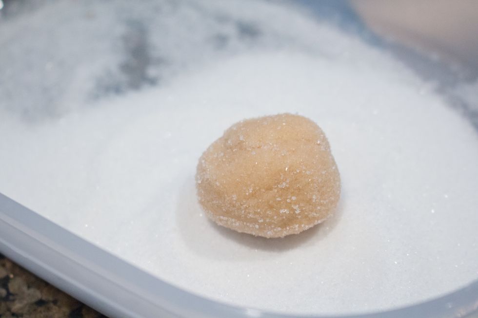 until the cookie dough is well covered in sugar.