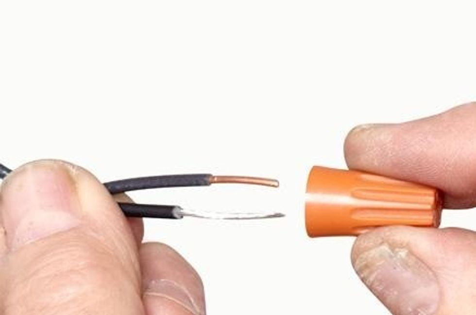 Untwist the old fixture's wires from the wire nut (wire cap) then attach the new fixture's wires to the cap with the wire from the wall.