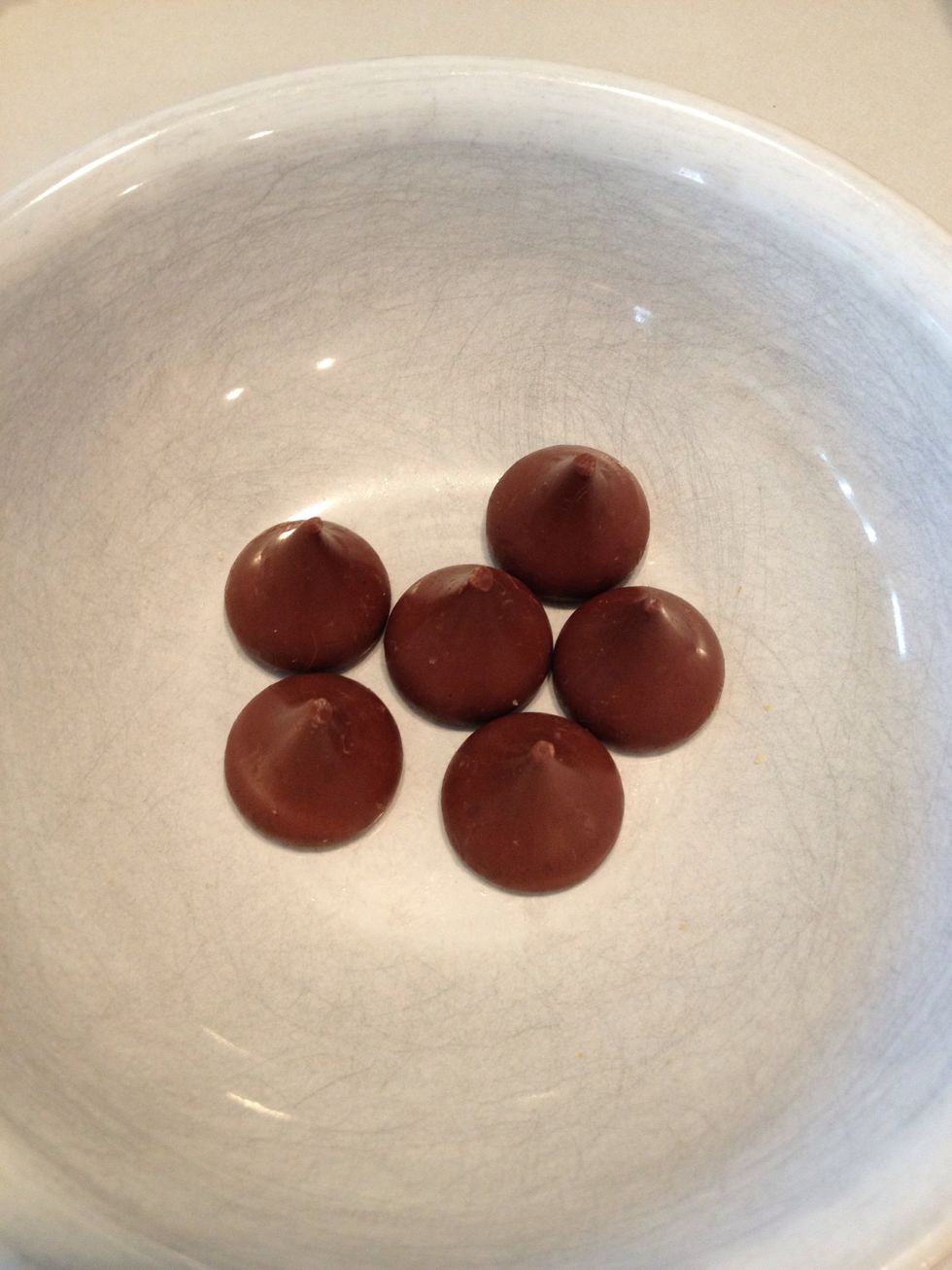 Unwrap 1 Hershey's chocolate kiss for each S'more you will make. Set aside.