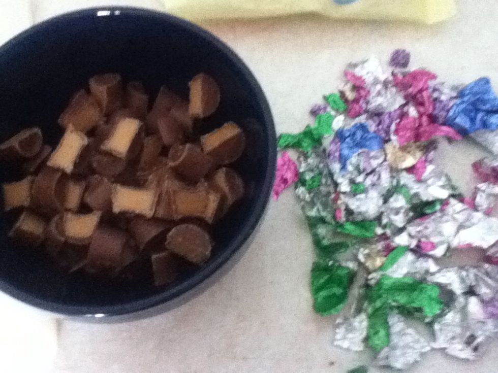 Unwrap 40 rolo's and cut them in half
