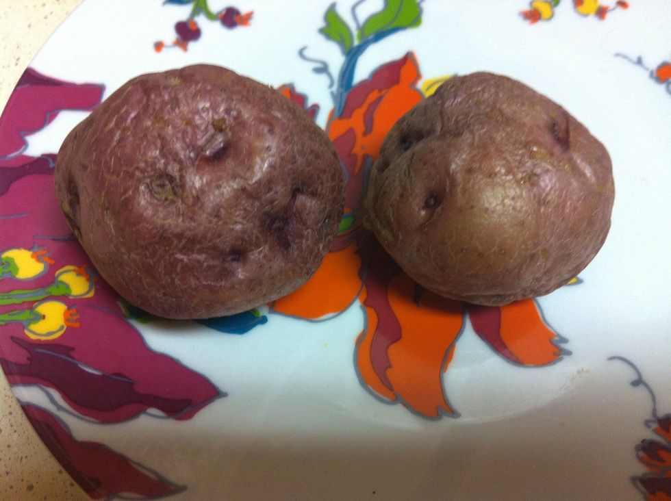 Unwrap the potatoes (careful! there will be steam)