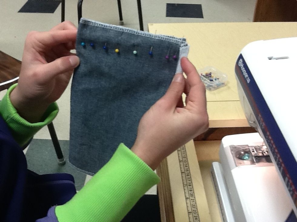 UNZIP THE ZIPPER HALF WAY. With the bag still inside out, pin the side seams together. Sew side seams using a 2.5 stitch length and 5/8" guideline.