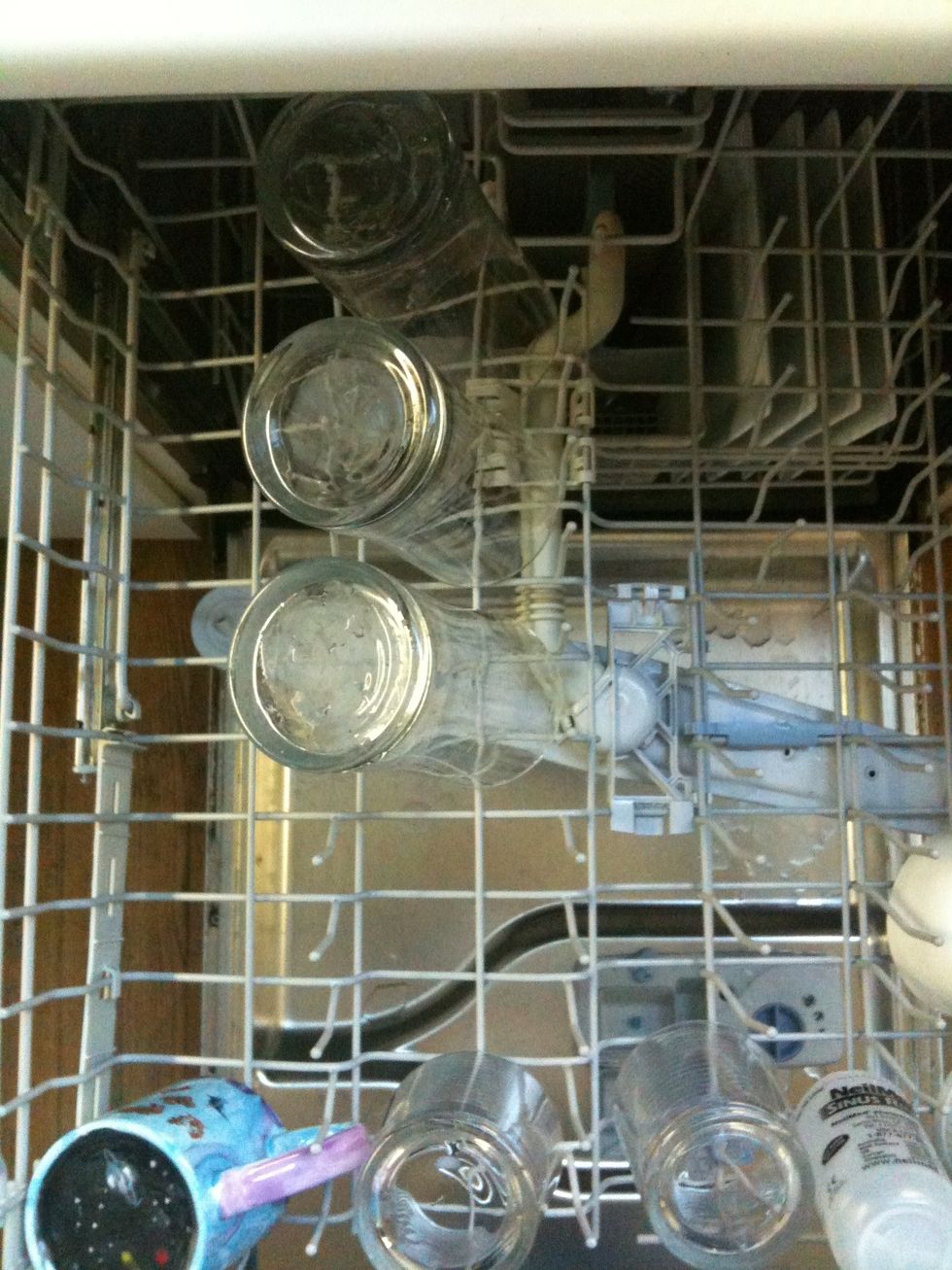 Up top, the tall water glasses fit best in the second row from the left.