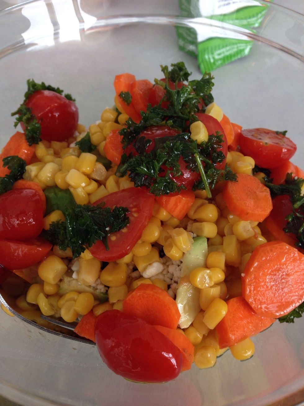 Update: same idea, different salad. This salad had canned corn & carrots at the bottom, tomatoes, feta cheese, sunflower seeds, avocado, parsley, and greens. This pic shows the bottom of the salad.