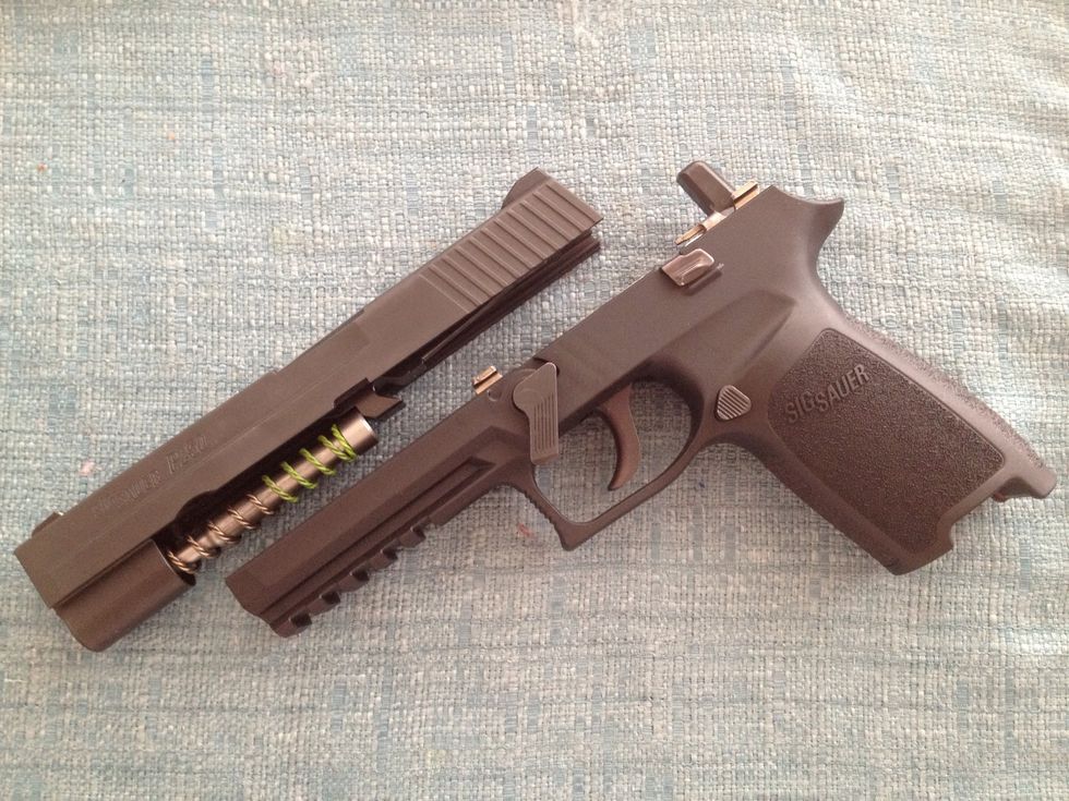 Upper slide separated from the pistol frame.