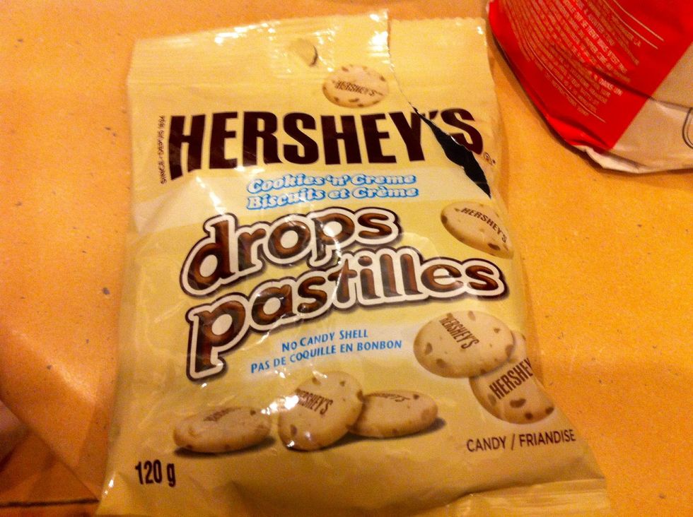 Use 1cup of Hershey's cookies n creme drops. You could also use the cookies n creme chocolate bar.