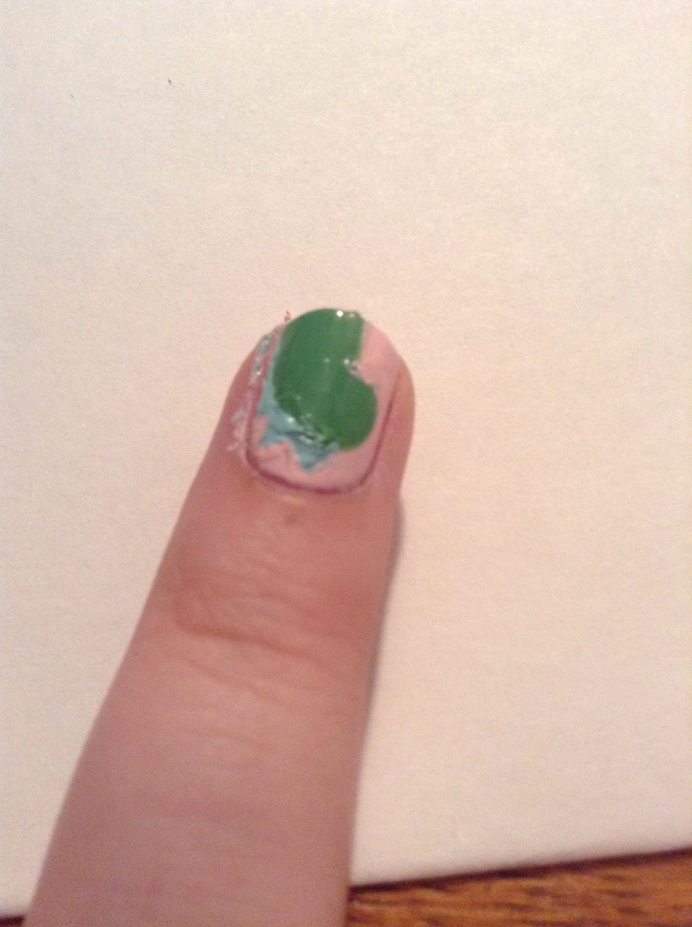 Use a a small dotting tool (or toothpick, pencil, bobby pin) make the little triangle spikes up it's back.