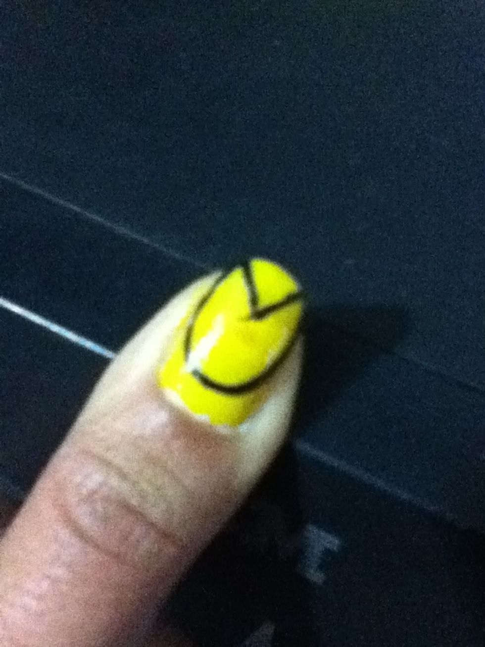 Use a black striper to make a "V" on your tip for the mouth and make a circle to create the body