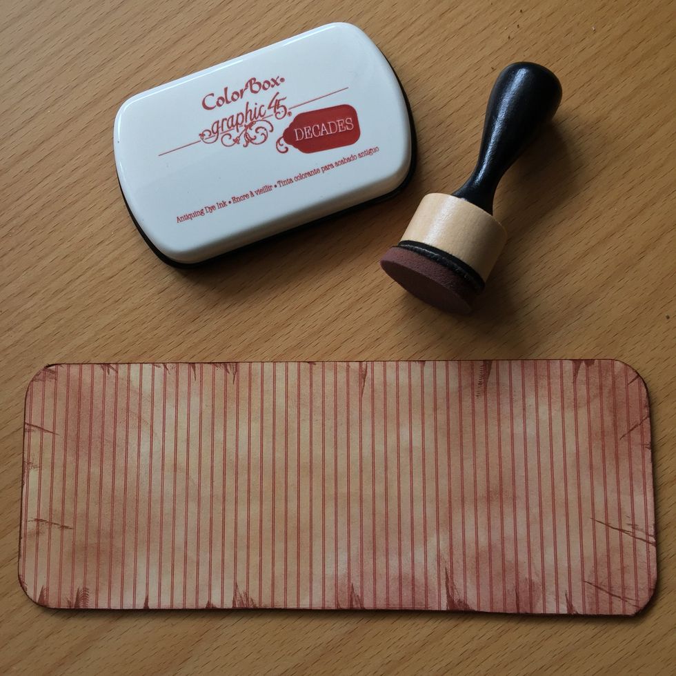 Use a blending tool to spread more ink on the surface.