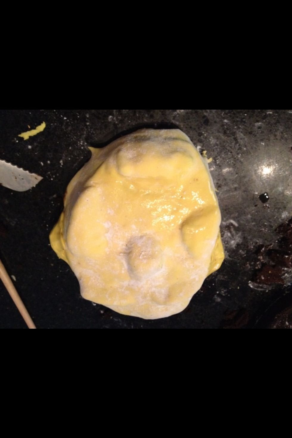 Use a brush and water to smooth out the fondant