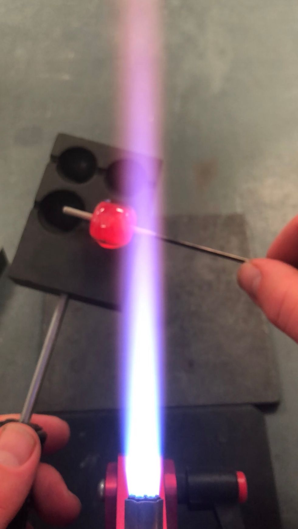 Next, we will apply the first clear encasement layer. Stripe hot clear