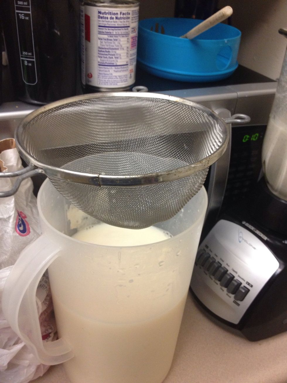 Use a colander. I already added water, condensed milk, and sugar.