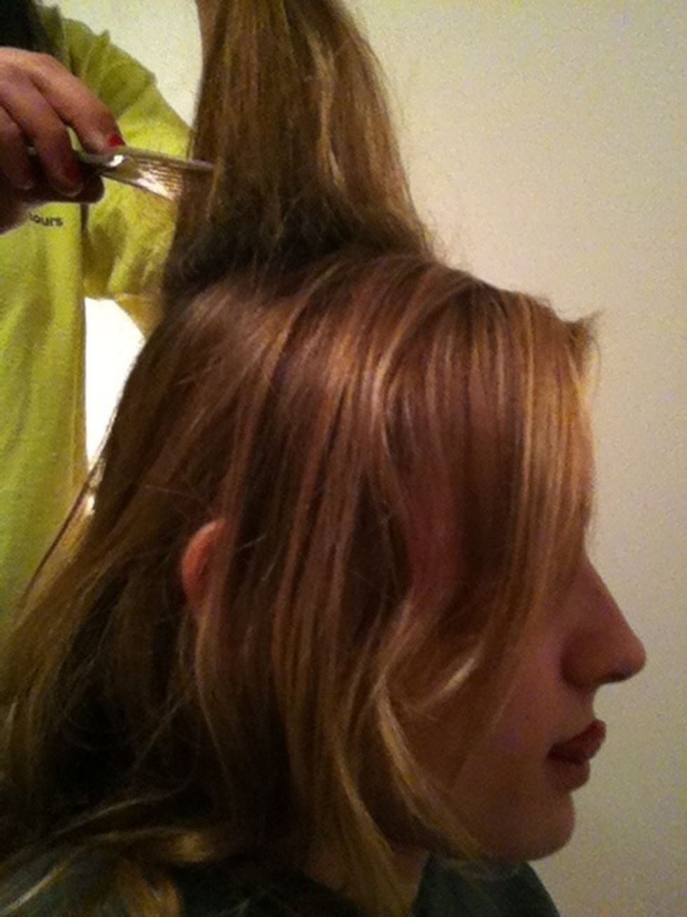 Use a comb and back comb the thick piece of hair you grabbed