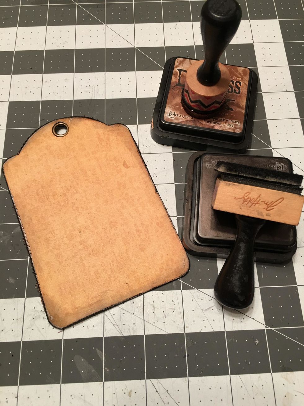 Use a combination of Gathered Twigs Distress Ink and Black Soot Distress Ink to ink the edges of your tags, front & back.