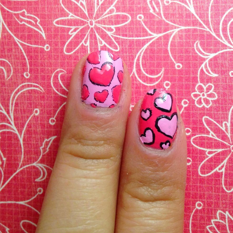 Use a complimentary pink polish and fill out the heart.