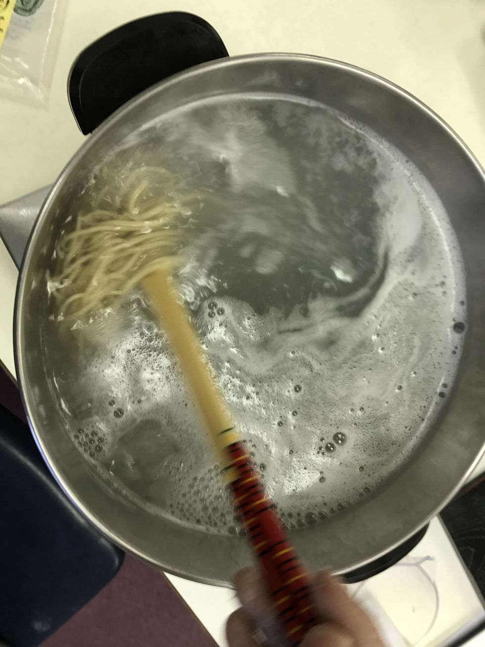 Use a cooking chopstick, to stir the soba noodles and separate the soba clumps. Do this for 30 seconds.