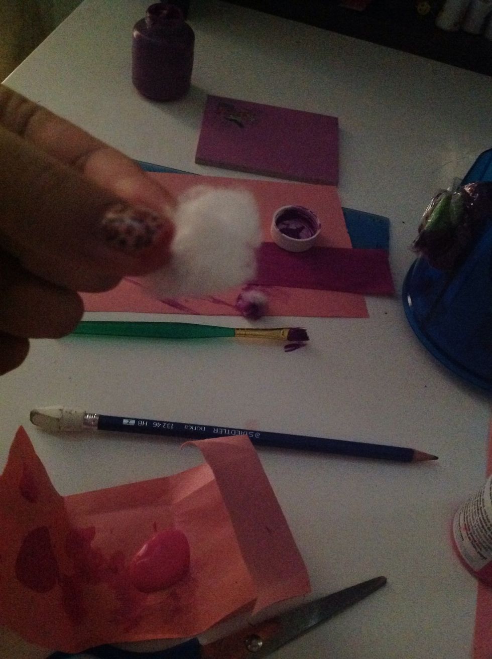 Use a cotton and dab it out on the purple and they will blend by the selfs